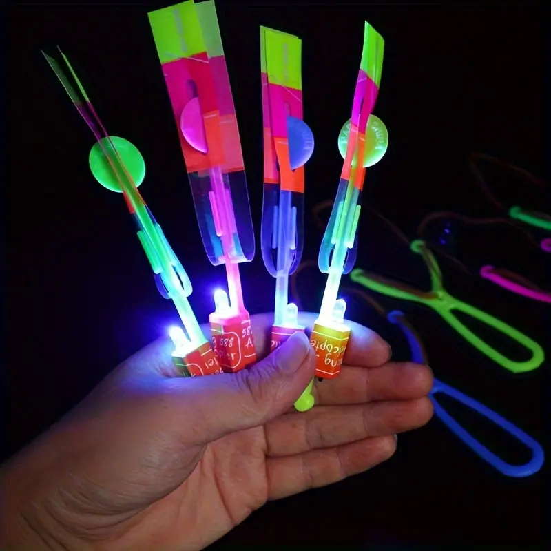 Baikf 8pcs, Led Lighting Up Luminous Toy, Flying Slingshot, Flying Toys, Fast Catapult Luminous Toy, Glow In Dark Party Supplies, Party Favors, Holiday Gifts, Children Gifts, Outdoor Luminous Toys