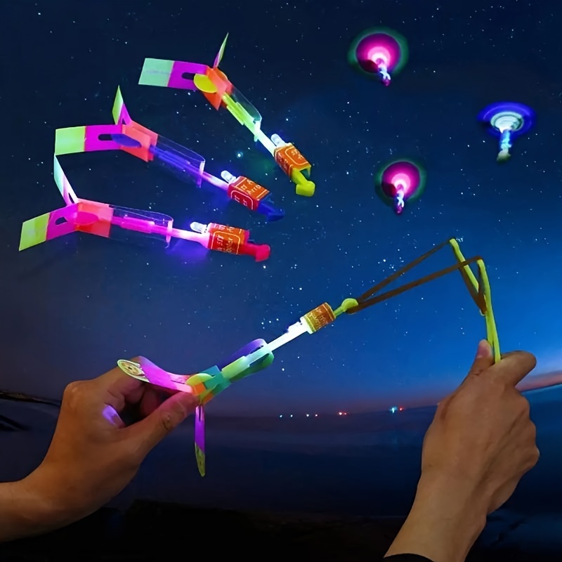 Baikf 8pcs, Led Lighting Up Luminous Toy, Flying Slingshot, Flying Toys, Fast Catapult Luminous Toy, Glow In Dark Party Supplies, Party Favors, Holiday Gifts, Children Gifts, Outdoor Luminous Toys